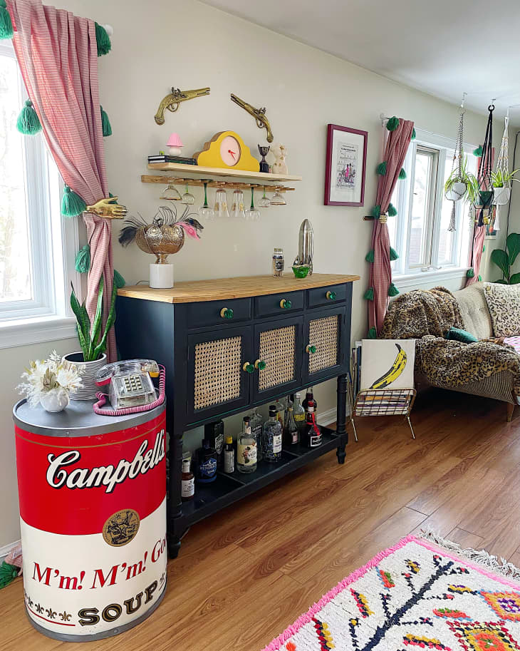 Bar cart next to a Campbell's Soup can end table
