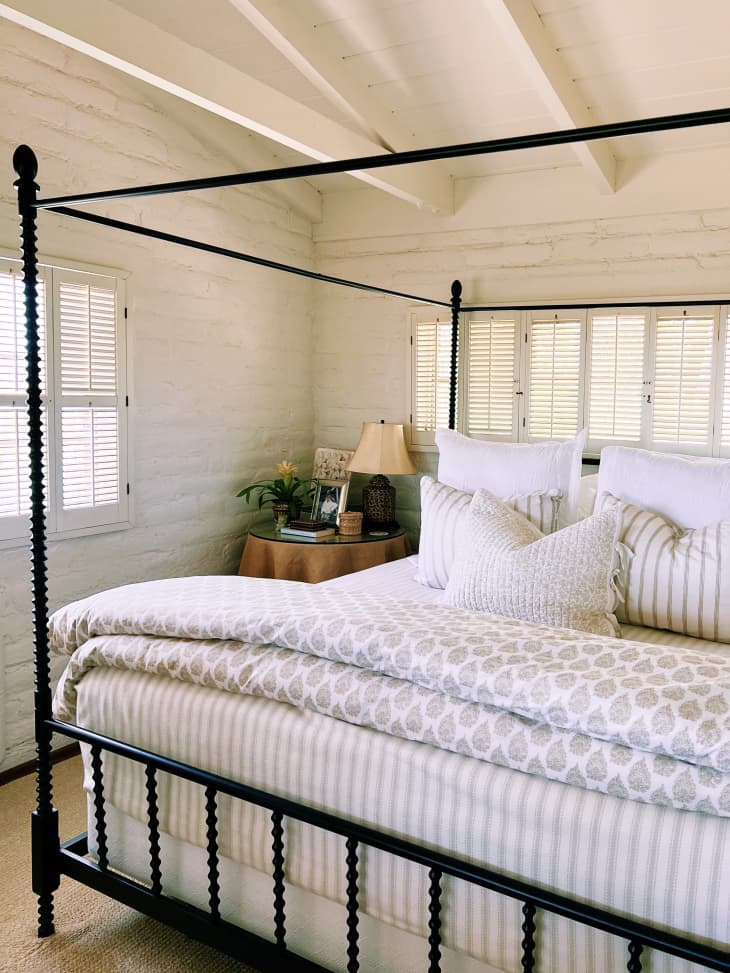 Large white bedroom with big bed
