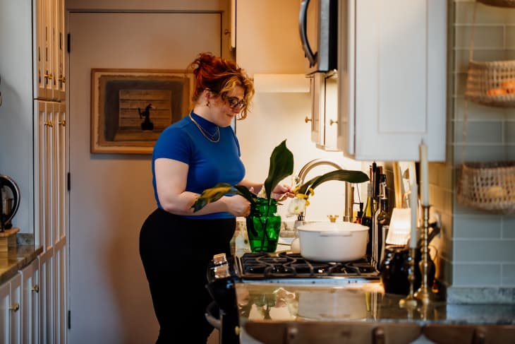 woman in the kitchen of her Chicago apartment