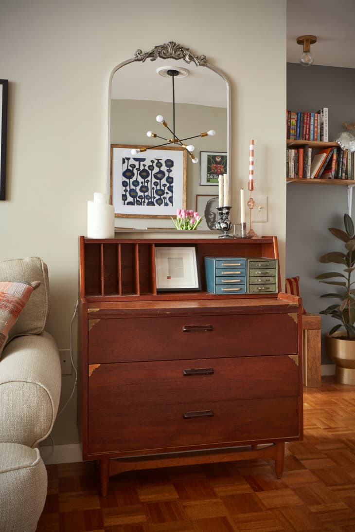 vintage desk with mirror above in living room