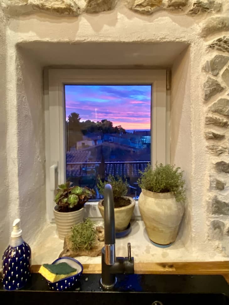Kitchen window with sunrise view over the Mediterranean Sea
