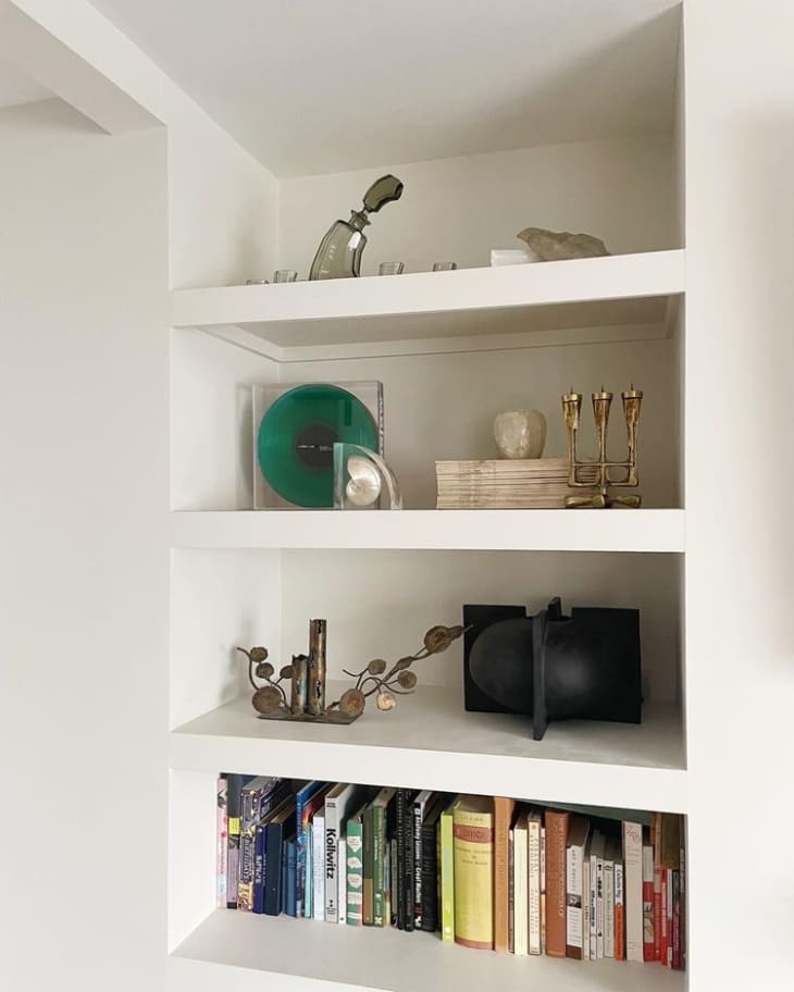 A white built-in bookshelf