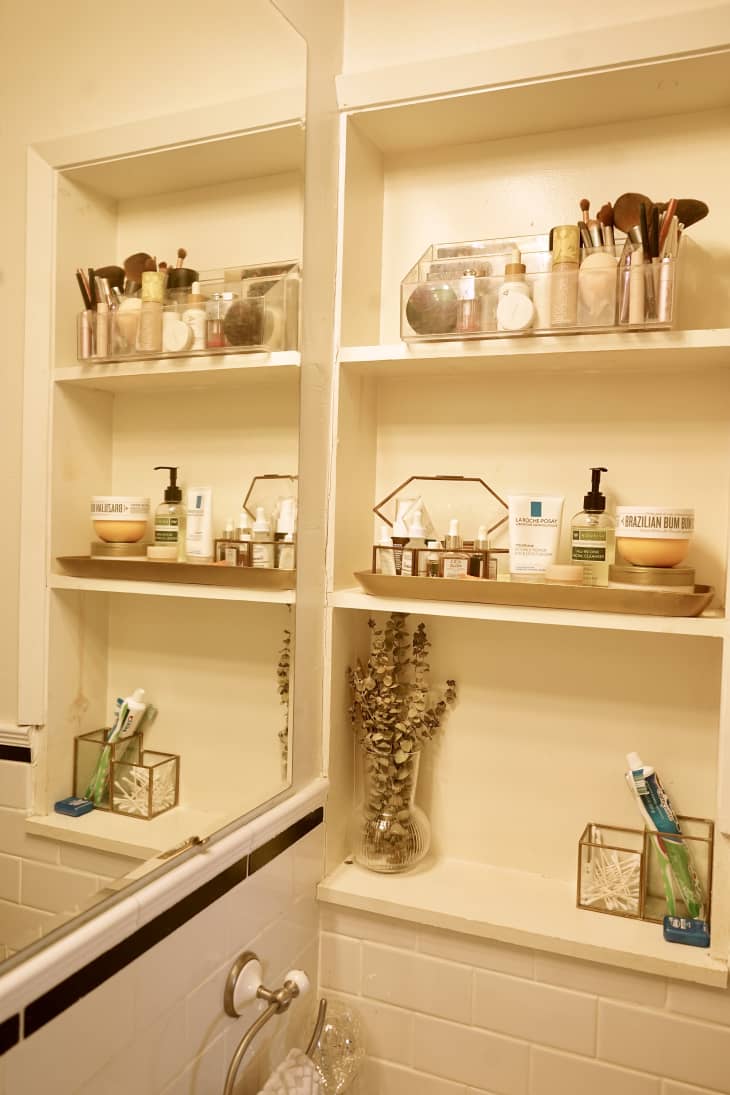 detail of bathroom shelves with grooming products