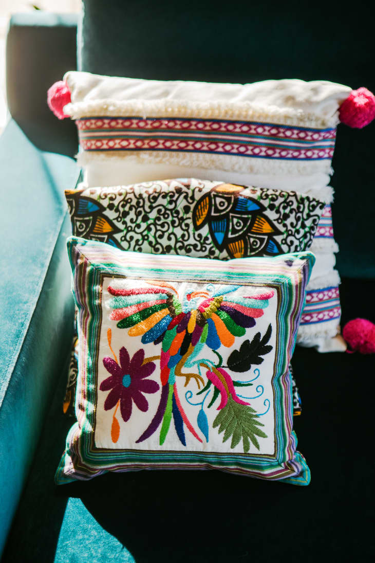 detail of colorful textured throw pillows