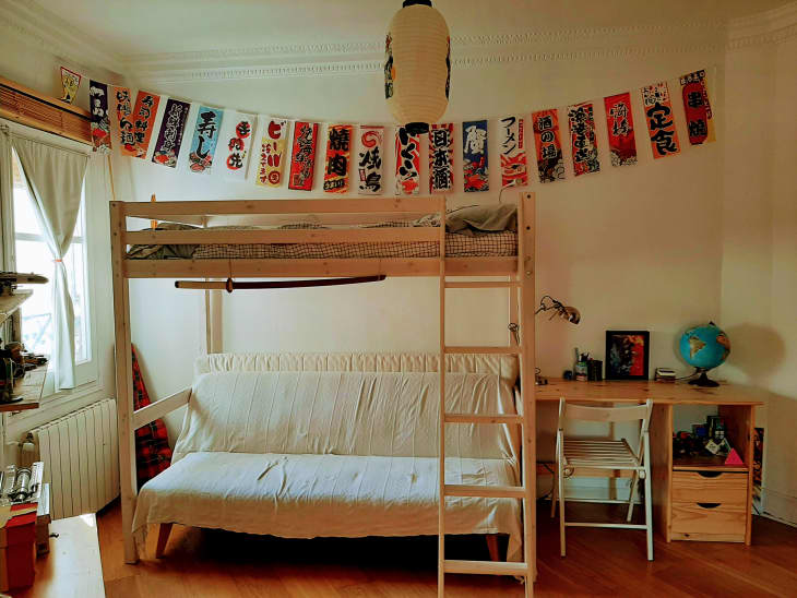 White kids bedroom with wood bunk bed and desk