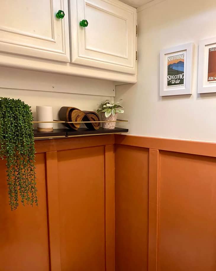 Terra cotta painted wainscoting in RV home.