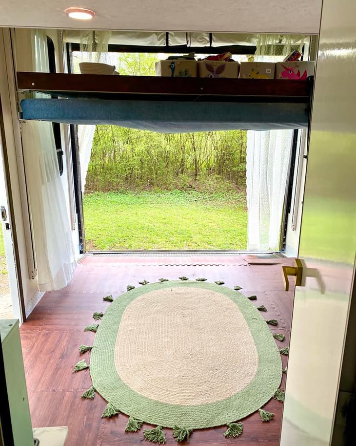 Rug in entry of mobile home.