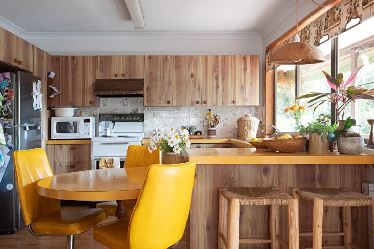 Wooden cabinets in vintage inspired kitchen.