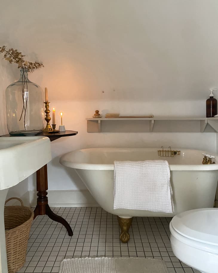 Vintage claw foot tub in newly renovated bathroom.