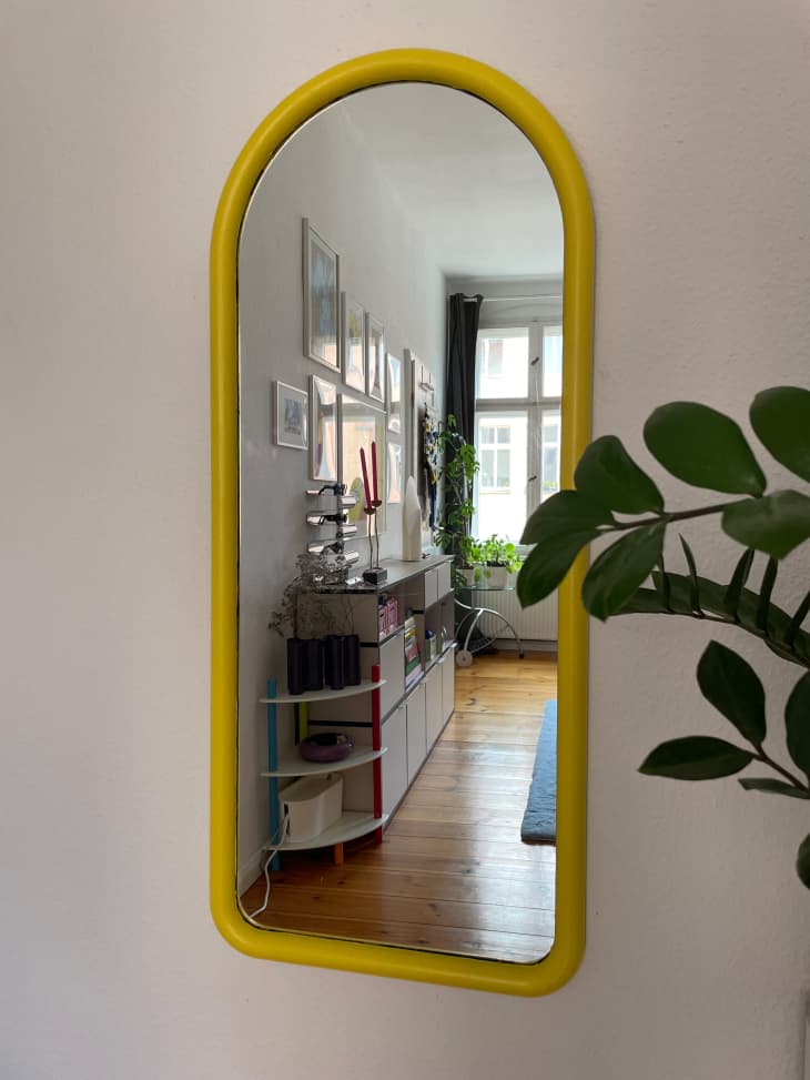 Yellow arched mirror.