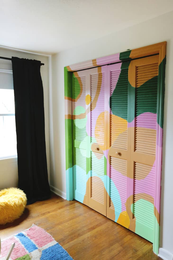 Colorful painted closet door.