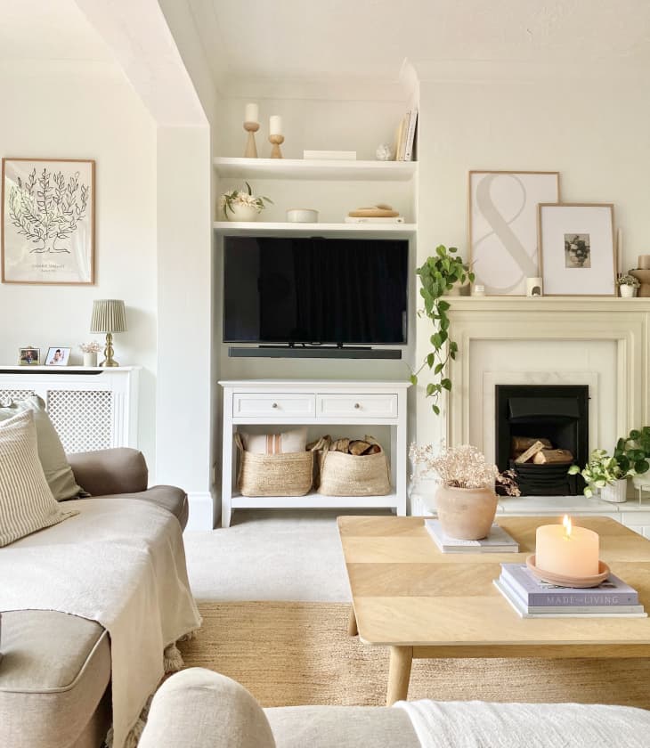 white living room furnished and decorated in pale neutral hues