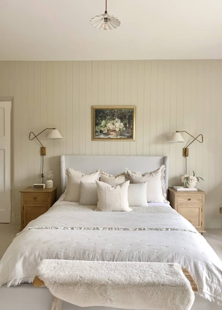 Beige shiplap bedroom with a lot of pale hues and wood
