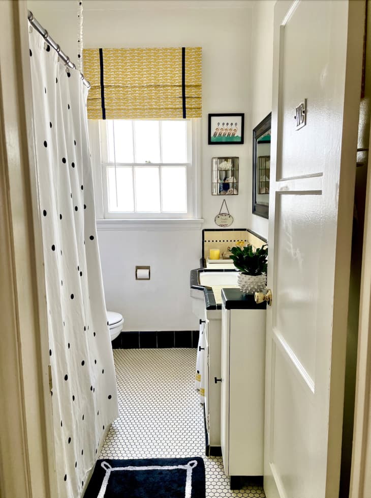 white and pale yellow bathroom with vintage tile