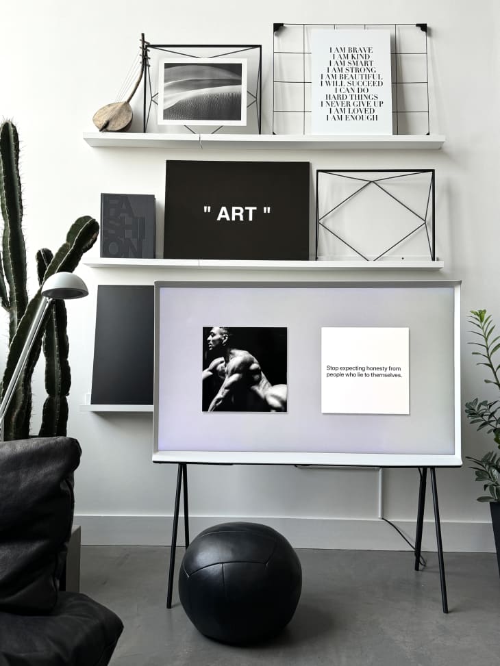 White and black furniture and art on shelving