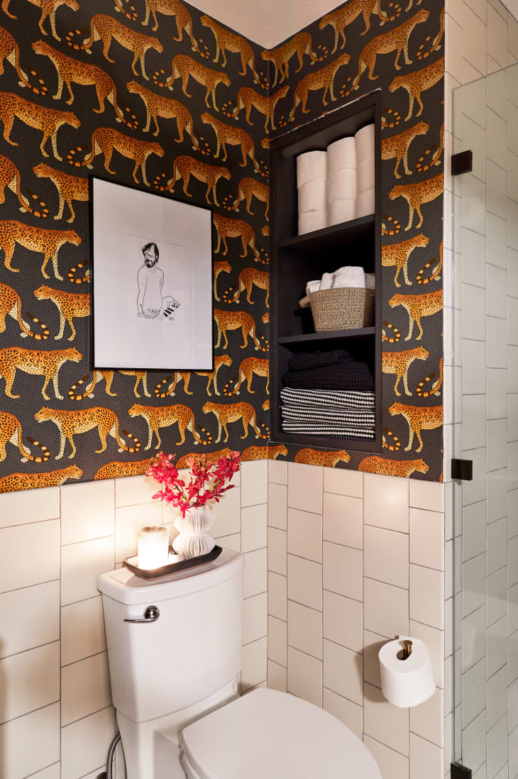 Animal print wallpaper in bathroom.