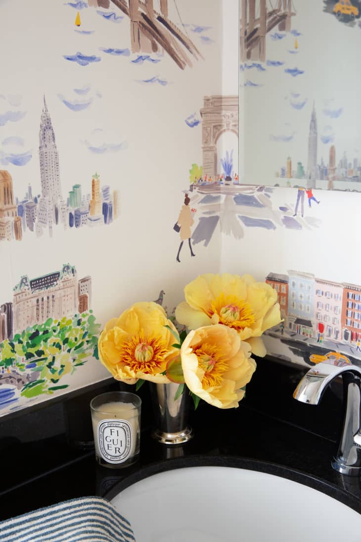 City scape watercolor wallpaper, yellow flowers, black countertops