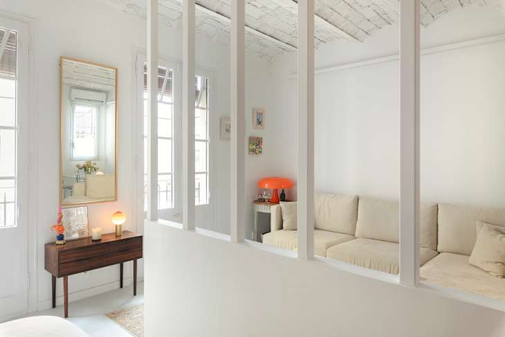 Tour a Small Renovated Spain Apartment with Vaulted Ceiling | Apartment ...