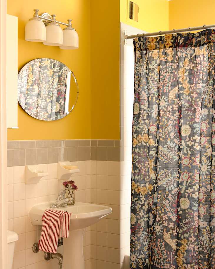 Yellow, gray and white bathroom