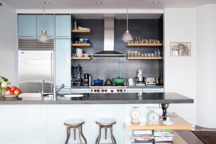 an industrial style kitchen with sturdy appliances