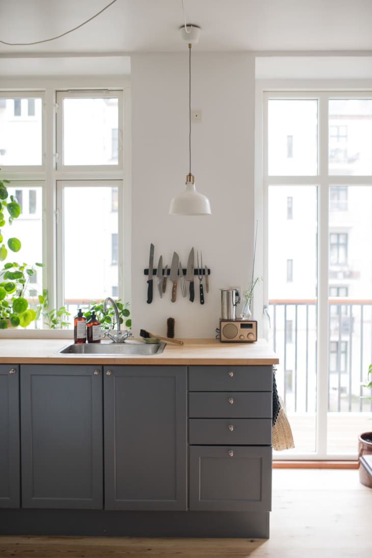 Howdens - Take inspiration from @hannah_hitchen on Instagram and pair grey  kitchen cabinets with copper accessories to bring warmth into any space:  howdens.com/kitchens/fitted-kitchens Kitchen featured: Fairford Graphite