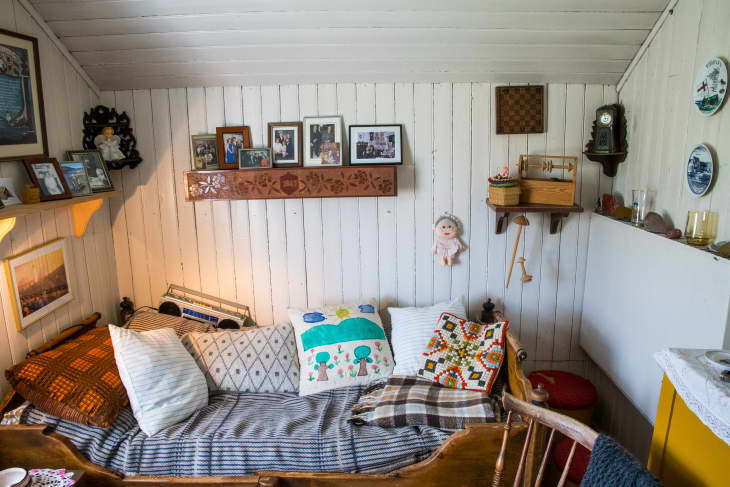 Nordic style bedroom with pillows and framed photos in Iceland