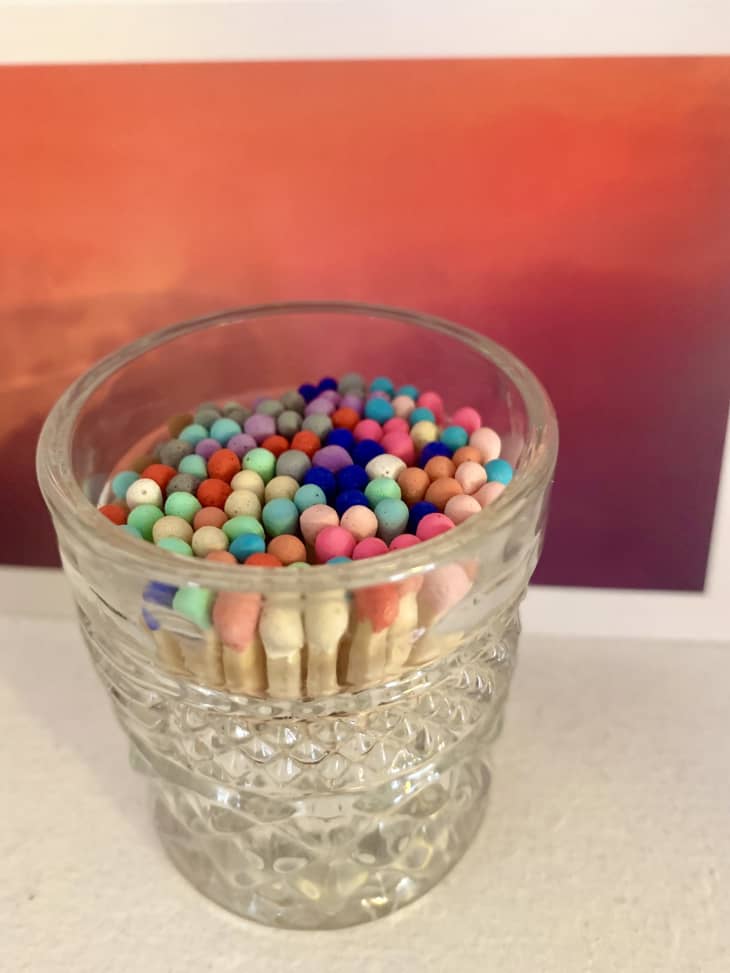 Colorful matches in glass shot glass
