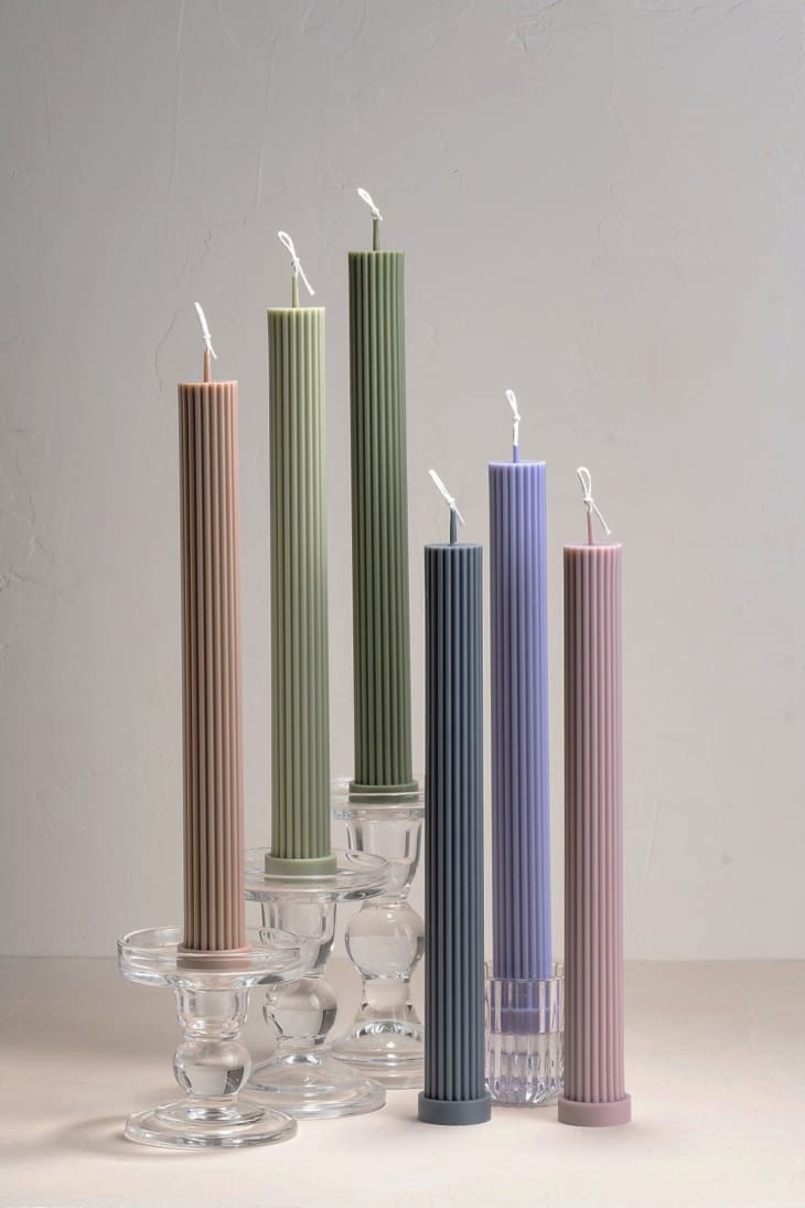 Ribbed taper candles in muted colors