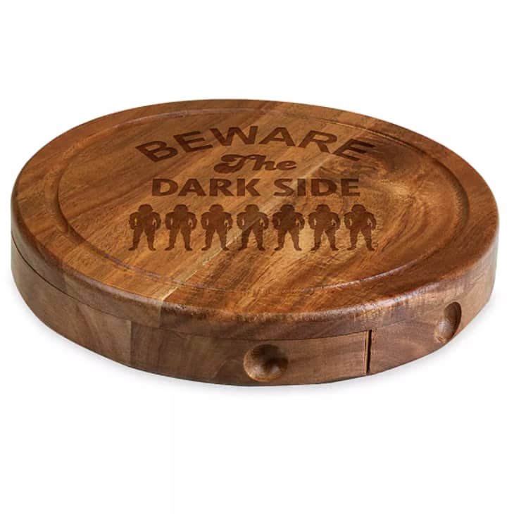 Circular cheeseboard engraved with "Beware the Dark Side"