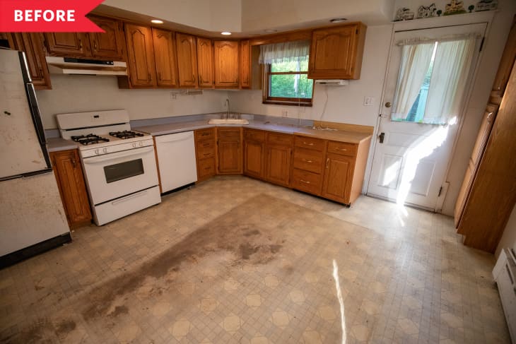 Before: Outdated kitchen with stained flooring and fridge