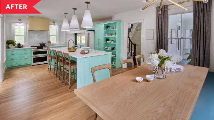 After: Open kitchen and dining area with aqua cabinetry, large island, and large dining table