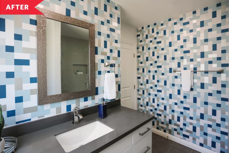 After: Modern bathroom with blue and white tile walls