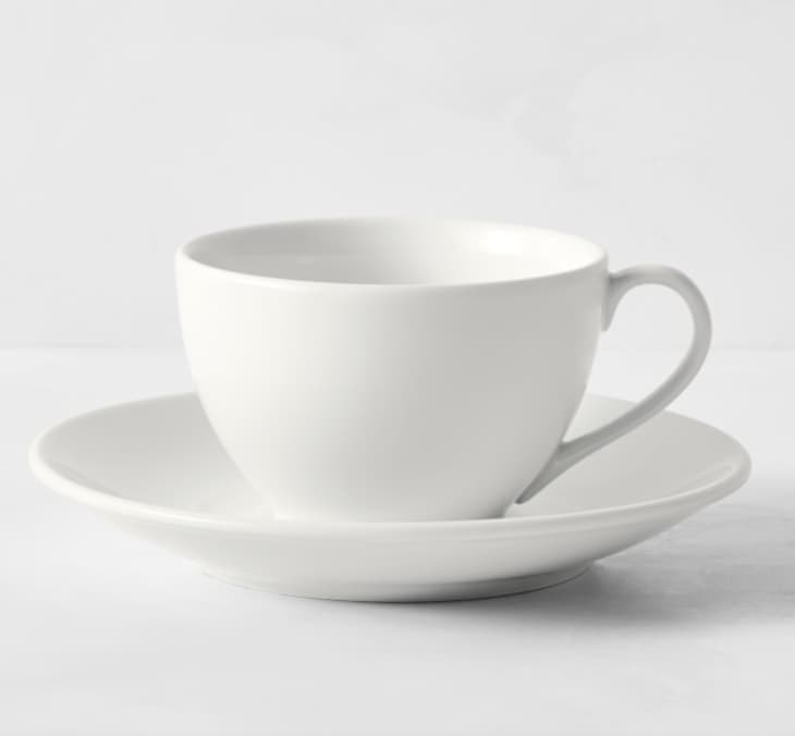 white tea cup and saucer