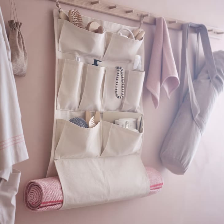 IKEA's New Hanging Organizer Was Designed Specifically To Hold Your Yoga Mat