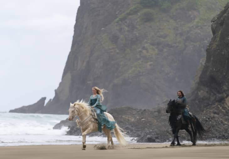 Still from Lord of the Rings Series showing two horses on a beach
