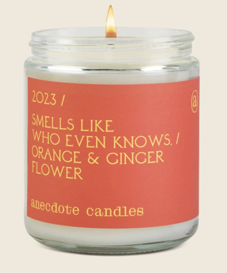 Anecdote candle that reads "2023 Smells Like Who Even Knows/ Orange &amp; Ginger Flower"