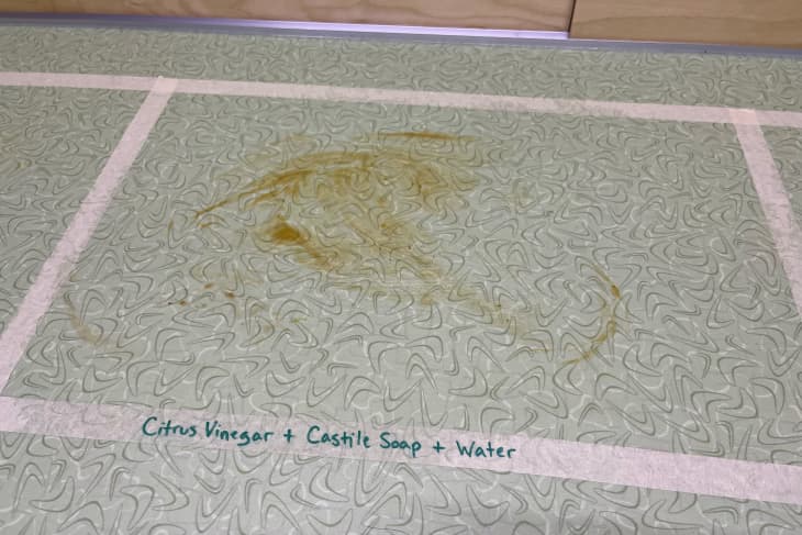 diy citrus vinegar, castile soap, and water counter cleaner during cleaning
