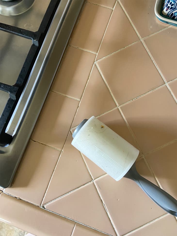 Lint roller on kitchen countertop.