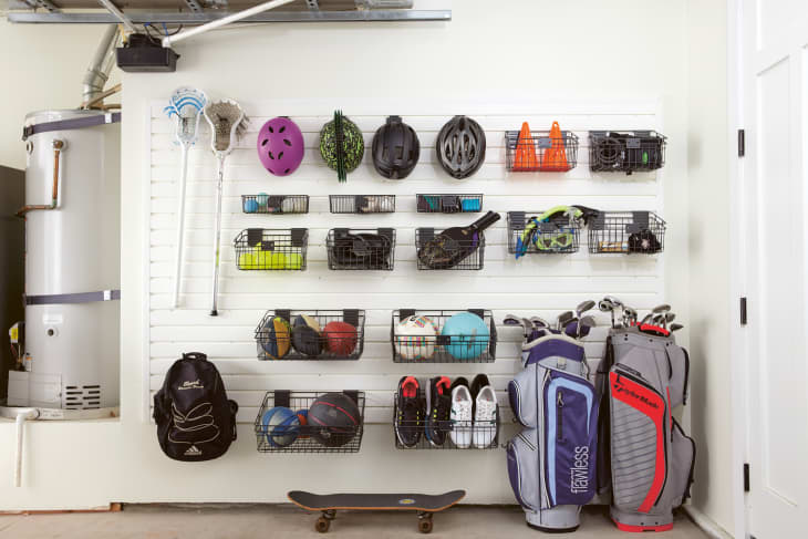 Garage with wall of hanging baskets for sports gear