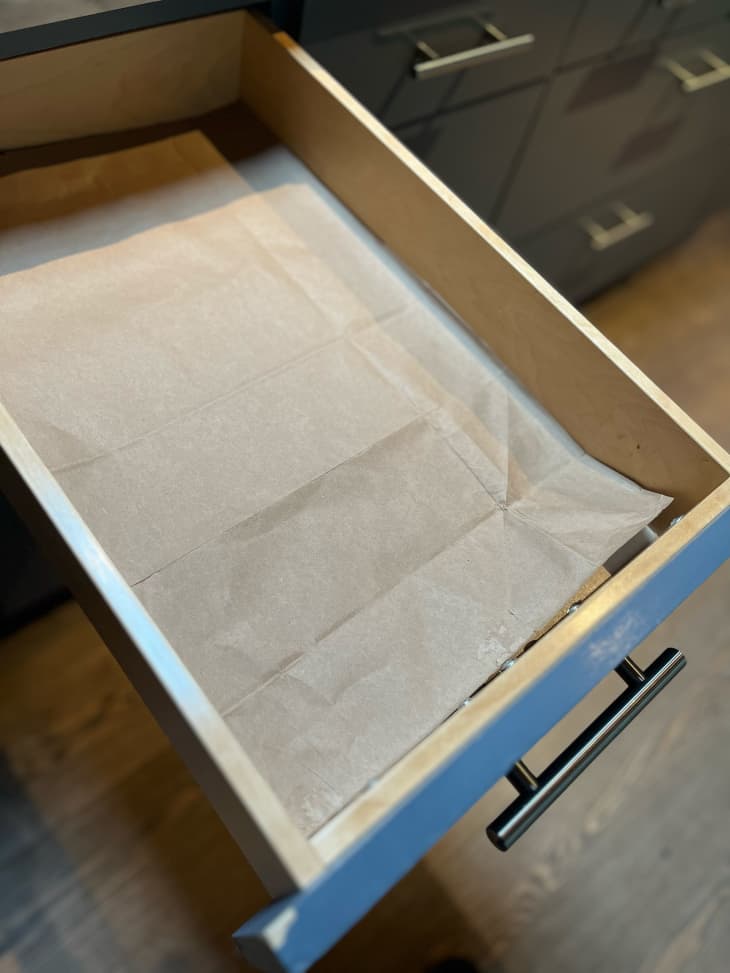 Silverware drawer with paper set in to measure it