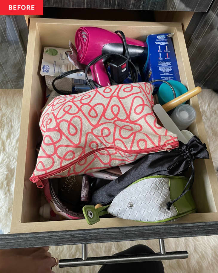 Before photo of make-up case and hair dryer in drawer.