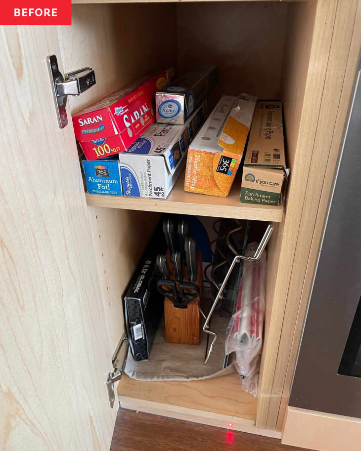 Before: a kitchen cabinet with saran wrap, aluminum foil, and other kitchen tools