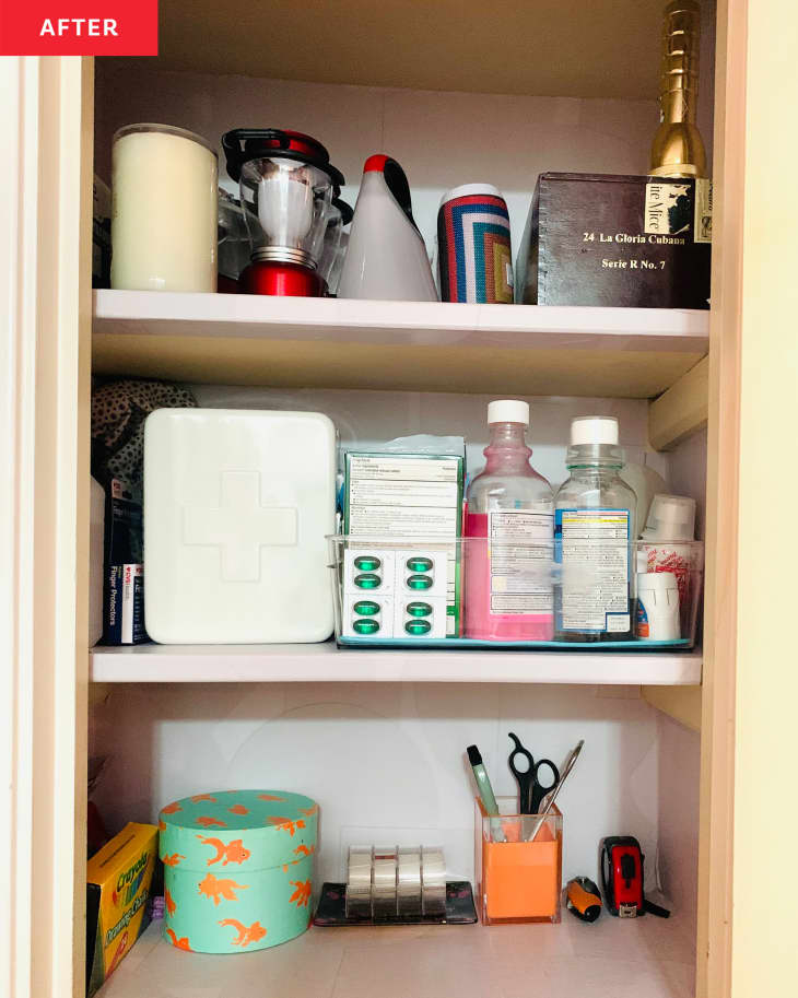 hallway closet after organizing: shelves are organized