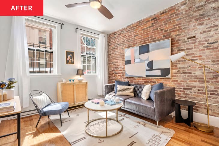 Newly staged living room in brick walled Boston condo.