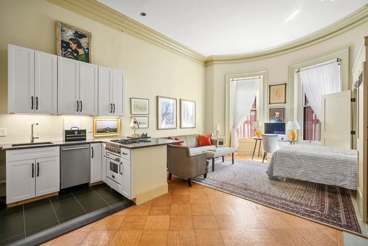 Murphy bed pulled out in Boston studio apartment.