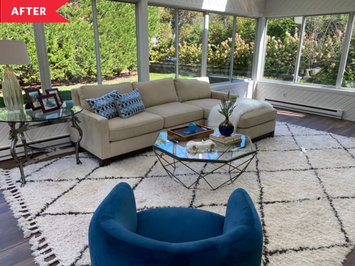 After: Bright living room with large windows and black and white beni-style rug