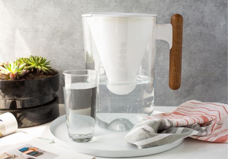 Glass water pitcher with wooden handle