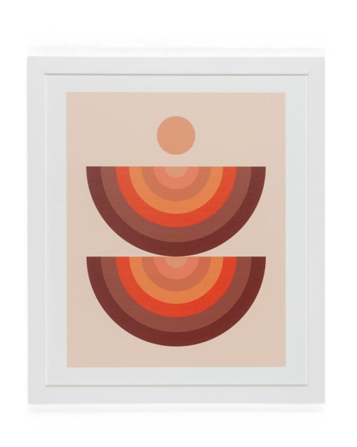 White framed rainbow and sun abstract art print in yellows, reds, and oranges.