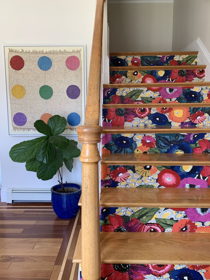 Stair risers covered in floral wallpaper