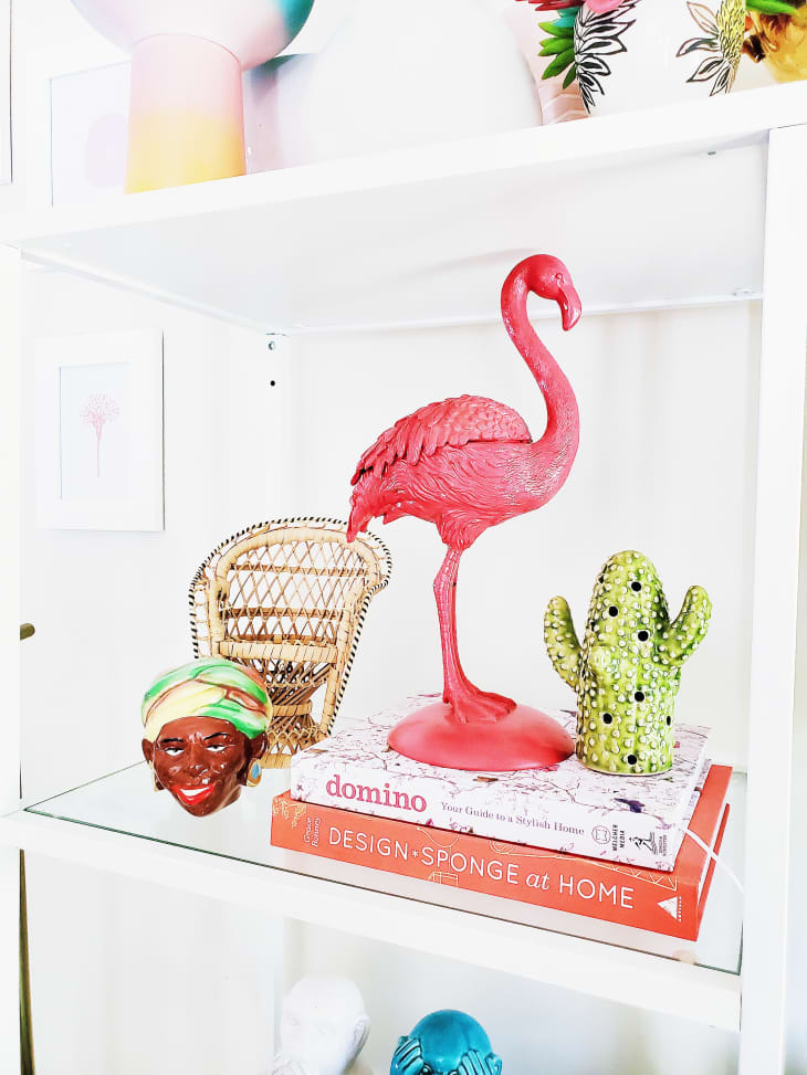 Flamingo sculpture on styled out shelves